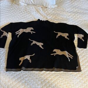 Black Sweater with Leopard Design